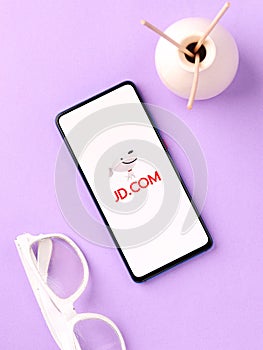 Assam, india - May 04, 2021 : JD.com logo on phone screen stock image.