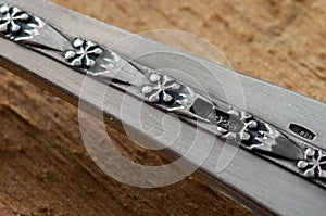 Assay mark 925 on a silver silverware. Sterling silver.