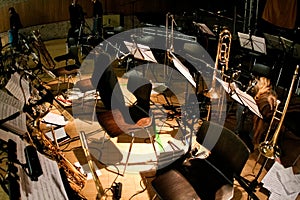 Assembled stage with instruments , chairs and music stand for big band concert . Gig without musicians. The Music Industry