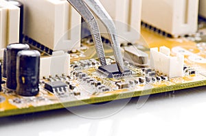 Assembling Computer Circuit Board Closeup