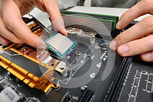 Assembling computer parts, closeup