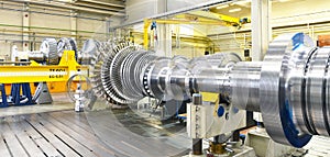 Assembling and constructing gas turbines in a modern industrial photo