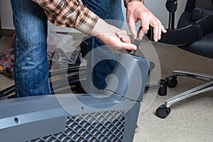 When assembling a crosstrainer, the service technician connects the computer to the electronics of the main unit using an