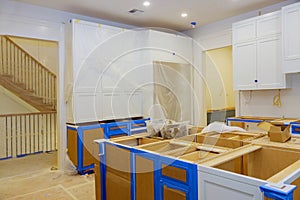 Assembling and installing modern kitchen cabinets