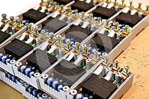 Assembly of electronic components for voltage relays. Manual assembly of electronic components for home electrical