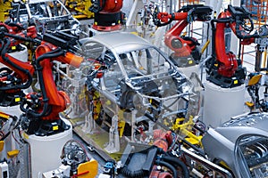 Automotive production line. Welding car body. Modern car Assembly plant