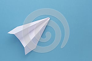 Assembly procedure of a paper white airplane. Origami