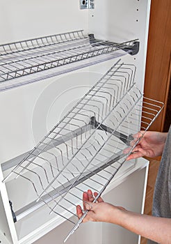 Assembly wire dish rack for drying dishes inside kitchen cabinet