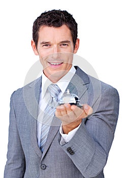 Assertive businessman showing a service bell