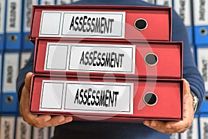 Assessment concept words. Folder concept. Ring binders.