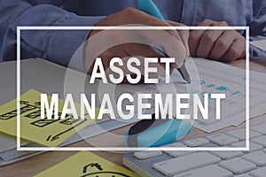 Asset management concept. Financial report on the desk.