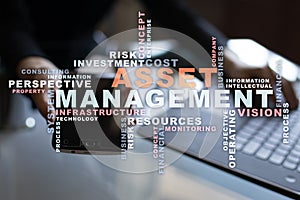 Asset management on the virtual screen. Business concept. Words cloud. photo