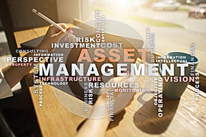 Asset management on the virtual screen. Business concept. Words cloud.