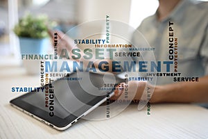 Asset management on the virtual screen. Business concept. Words cloud.