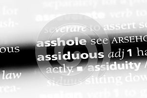 Assiduous word in a dictionary. assiduous concept.