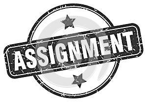 assignment stamp. assignment round grunge sign.