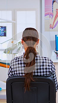 Assistant with ppe suit coming in reception