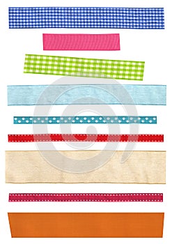 Assort of colorful beautiful ribbons. Many narrow strip of fabric in different patterns