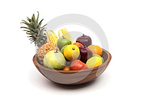 Assort fresh fruits and vegetables in basket isolated on white background