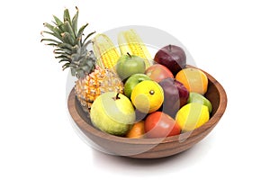 Assort fresh fruits and vegetables in basket isolated on white background