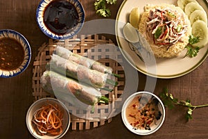 Assorted asian dinner, vietnamese food. Chicken rice, spring rolls