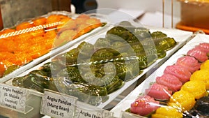 Assorted baba nyonya food angku kuih Red Tortoise Cake arranged on tray selling at the restaurant