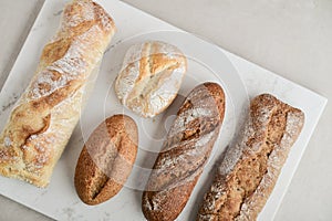 Assorted bakery products including loafs of bread
