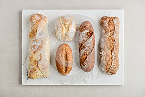 Assorted bakery products including loafs of bread