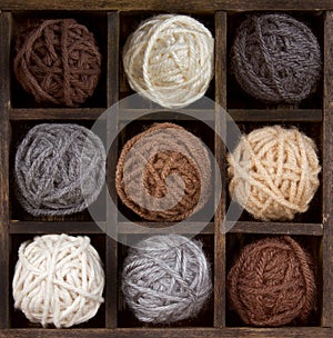 Assorted balls of yarn in a box