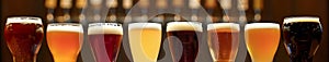 Assorted Beer Glasses in a Row