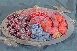 Assorted berries on large silver platter