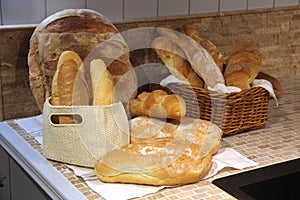 Assorted bread basket on kitchen