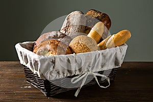 Assorted bread in wooden basket