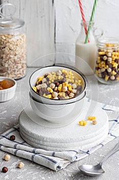 Assorted breakfast cereals: chocolate balls and honey stars