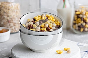 Assorted breakfast cereals: chocolate balls and honey stars