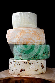 Assorted cheese : classic caciotta , with mushrooms, green with pine nuts and marble queso fresco made of cow milk.