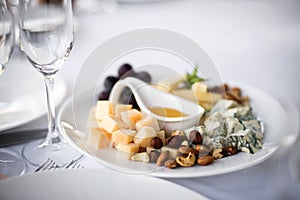 Assorted Cheeses with Grapes and Nuts on Platter