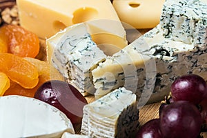 Assorted cheeses with mold, Maasdam, Roquefort