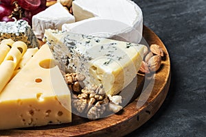 Assorted cheeses with mold, Maasdam, Roquefort, brie and others