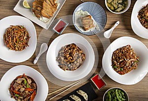 Assorted Chinese food. Famous dishes of Chinese cuisine on the table. Top view. The concept of Chinese restaurant. Asian style