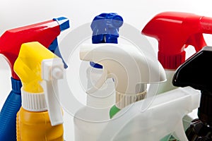 Assorted cleaning spray bottles photo