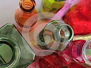 assorted colorful bottles and reflections.. Dig deep, seek within yourself