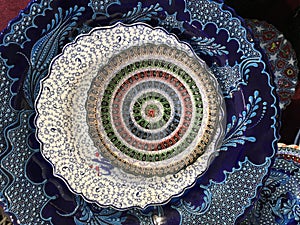 Assorted decorative ceramic plates shot from above