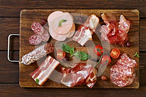 Assorted deli meats - ham, sausage, salami, parma, prosciutto