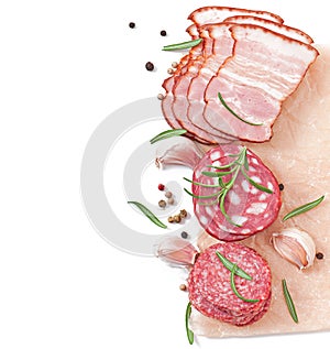 Assorted deli meats, rosemary and pepper