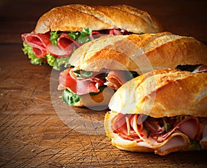 Assorted delicious baguette sandwiches photo