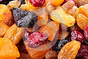 Assorted dried fruit and berries as a background