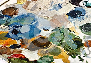 Assorted dry colors on a painters palette