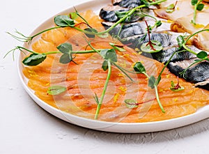 Assorted fish on a plate. smoked and salted fish