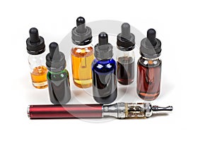 Assorted flavors of vape juice and an ecigarette